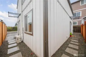 Parking spot and door off dining on the left, with the door facing south on the right. This door can be accessed from  the alley or from 38th.