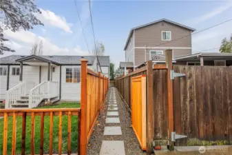 Paved and lit walkway to access the home.