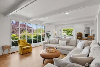 HUGE picture windows create light and bright open concept living space!