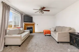 Flowing directly from dining area, we enter the family room. A gas fireplace adds just the right touch on chilly Whidbey nights.