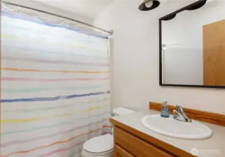 Off the hall we have another full bathroom that was recently updated.