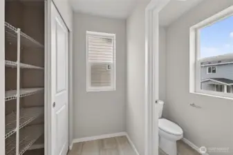 One of 3 linen closets