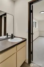 Three quarter bathroom with shower downstairs