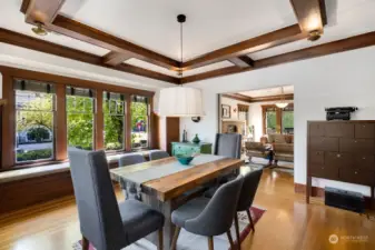 Dining room includes built-in benches with storage underneath