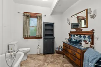 Bathroom with  claw tub.