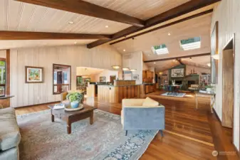 Looking from the living room toward the kitchen with the formal dining area beyond.