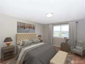 Primary bedroom features 2 closets as well as a 5 piece en suite. virtually staged