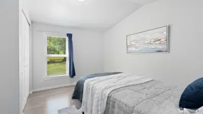 The first bedroom offers a peaceful green view that brings the outdoors in. Wake up to the soft natural light filtering through the windows - it’s a calming way to start and end each day.