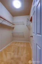 Walk-in closet off primary bedroom.