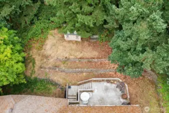 Back yard is terraced and ready for all your ideas! Lots of space here!
