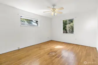 Bedroom 1, real hardwood floors, walk-in closet