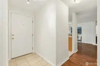 Front entry leading to open living and dining area.