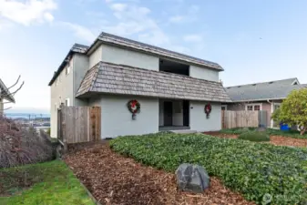 Sought after Grand Ave location! Positive cash flow 4-plex with secure parking, storage, and incredible sound and mountain views.