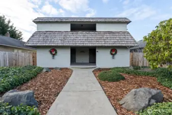 Easy to maintain landscaping and newer common area flooring. Features a well cared for flat roof and stucco siding.