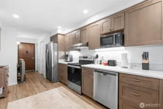 Each unit is equipped with a refrigerator, range, dishwasher, and some have a microwave. Laundry is within the building on the lower level.