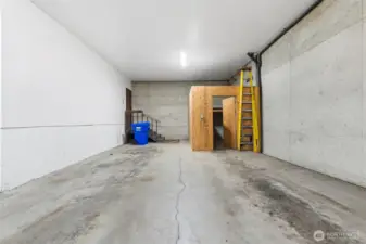 Interior access to building is great for rainy days! The structure is just one of the building owner storage rooms.
