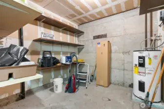 Building owner storage and supply room. The water heater serves the laundry room.