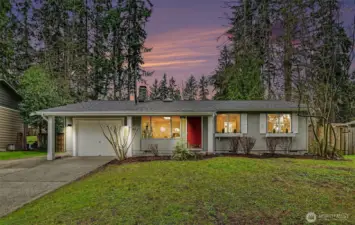 Charming rambler with modern touches & expansive fully-fenced yard.