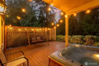 Cover deck with private hot tub.