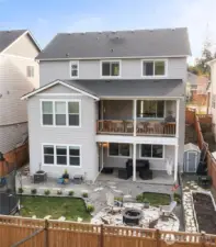 MOVE IN READY HOME is HUGE. Over 4,100 sq ft on three floors, with a ground-floor patio, main-level covered deck and a front covered porch with an adorable porch swing. Bonus space on EVERY level, 5 bedrooms (4 up, 1 down) and four bathroom locations. ALL the space you've been looking for.