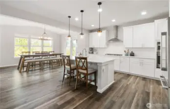 So much dining space and clearly, no neighbors watching your dance around the kitchen while you create delicious dinners. (Or plate the Door-Dash delivery :)
