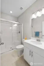 Downstairs has ALL the flex / generation space you'll need, including this FULL bath. Very convenient to generational living.