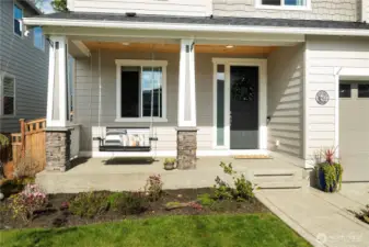 Front porch swing is a PERFECT place to catch a nice breeze, listen to the birds chirping, sip a beverage...or even more realistically, keep an eye on the Littles as the play in the safety zone of the huge cul-de-sac just a couple of doors down from you. Clear bird's eye view and them (unless you doze off while swinging...then you'll be watching the backs of your eyelids!