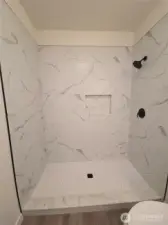 tiled shower, low curb