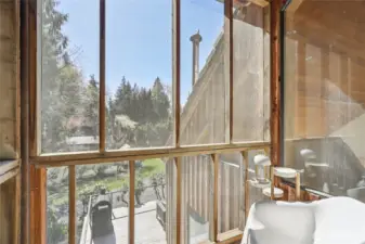 Screened in upper level porch off the family room