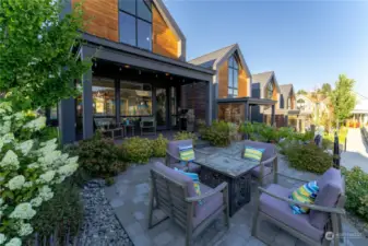 Exterior view 1 of home with outdoor living space.