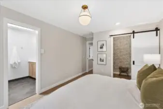 Large primary bedroom with ensuite bathroom and walk-in-closet