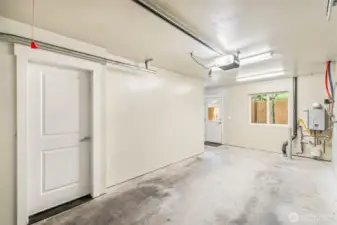 Large garage with tons of storage.