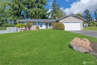 Gorgeous front yard complete with a rose bush by the door :)