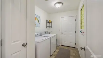 Washer and dryer are included. The oversized garage provides ample space for parking, storage or hobbies.