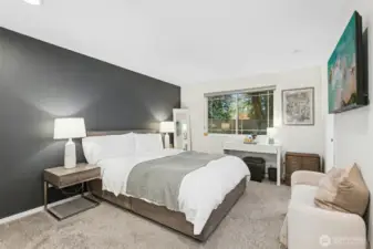 Primary bedroom with ensuite continental bath