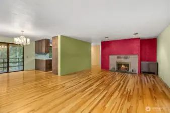 Living room looking into Dining are, kitchen and Hallway.