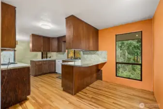 Kitchen with bar/eating space