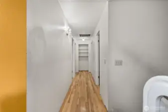 Hallway leading to Primary, 2 bedrooms and full bath.