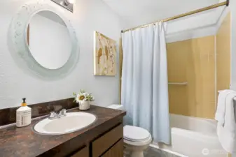 Full Bathroom located in the hallway on the main floor