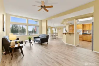 Sun-filled great room with open layout and expansive windows