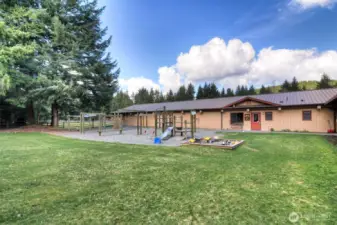 Community Center with attached stables and caretaker office.