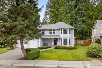 Set in Amberley on English Hill, this inviting Redmond home pairs classic curb appeal with a peaceful evergreen backdrop, plus a welcoming covered entry and a spacious two car garage.