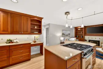 Rich cabinetry, abundant drawer storage, and a built in workspace create a kitchen that works as hard as it looks, perfect for meal prep, homework, or keeping household routines organized.