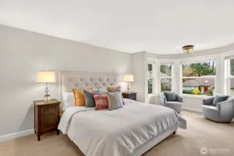 The primary bedroom offers generous space and a bright bay window, with the added value of an updated walk in closet and a private full bath for everyday comfort.