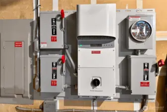 Energy forward features include a solar system with an updated inverter (Aurora PVI 3.0), neatly organized equipment that supports long term efficiency.