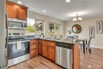 Fun & easy kitchen to work in being so accessible to the rest of the Great Room & backyard.  Range is NEW!