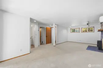 The split-level layout offers a practical flow, separating living spaces while still feeling connected.