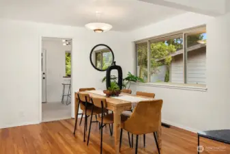 Dining opens to kitchen