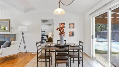 Dining room offers views to the spacious backyard.