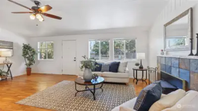 Enter to a spacious living room with hardwood floors throughout most of the main living spaces.